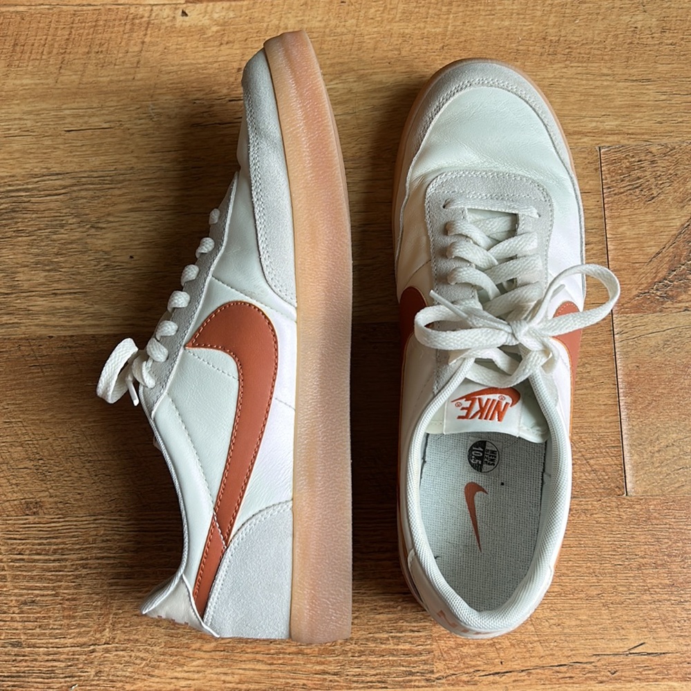 White Killshot Nikes with orange swoosh